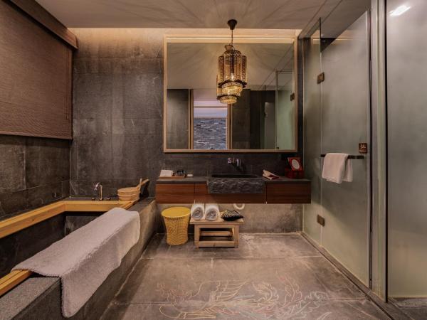 Shenzhen OCT Gankeng Ancient Town Phoenix Hakka Hotel : photo 5 de la chambre suite familiale