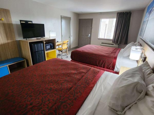 Days Inn Windcrest by Wyndham San Antonio : photo 1 de la chambre chambre 2 lits queen-size - non-fumeurs