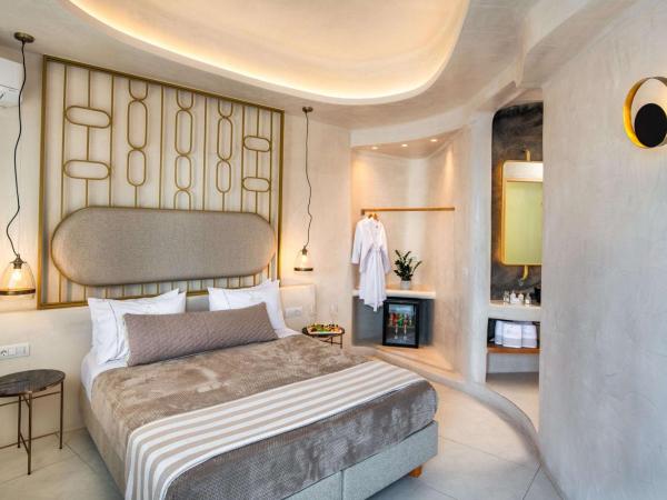 Athina Luxury Suites : photo 2 de la chambre suite supérieure avec bain à remous - vue sur caldera