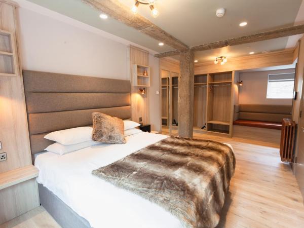 Clarendon Suites : photo 1 de la chambre chambre lit king-size