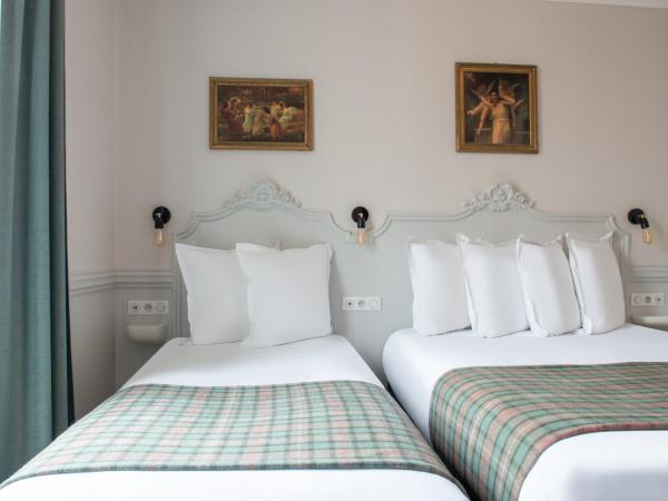 Hôtel De La Porte Dorée : photo 3 de la chambre chambre triple premium