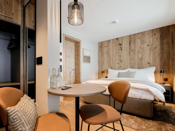 Postresidenz am See : photo 3 de la chambre chambre double ou lits jumeaux deluxe - vue sur ville