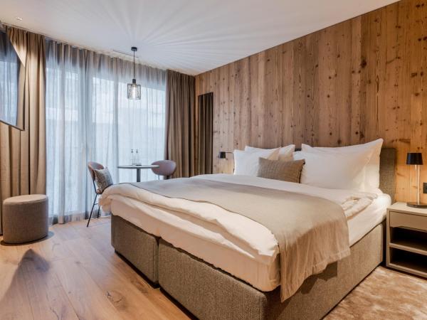 Postresidenz am See : photo 3 de la chambre chambre deluxe double ou lits jumeaux