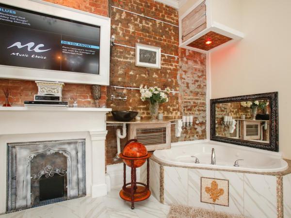 Fleur De Lis Mansion : photo 4 de la chambre suite deluxe avec baignoire spa