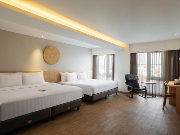 Aveta Hotel Malioboro : photo 1 de la chambre chambre familiale quadruple