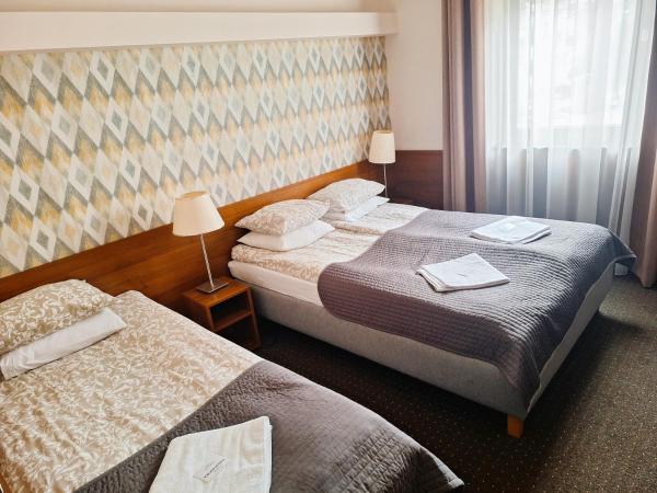 B & B Tomula : photo 1 de la chambre chambre triple avec baignoire