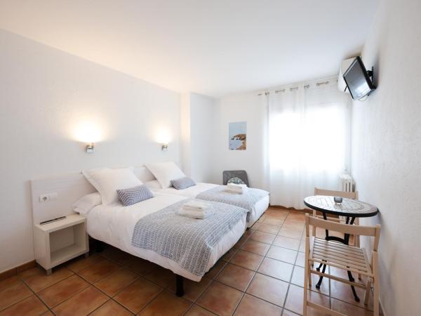 Hostal el Ranxo : photo 1 de la chambre chambre lits jumeaux avec salle de bains privative