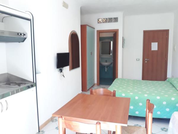 Paco Residence Benessere & Relax : photo 5 de la chambre studio avec vue sur jardin