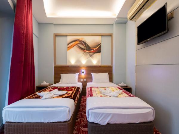 Tanha Hotel : photo 2 de la chambre chambre familiale