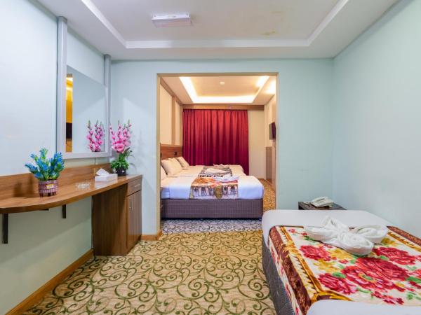 Tanha Hotel : photo 6 de la chambre chambre quadruple