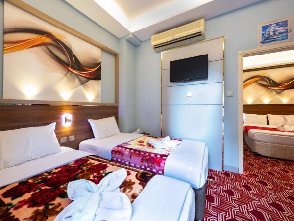 Tanha Hotel : photo 9 de la chambre chambre familiale