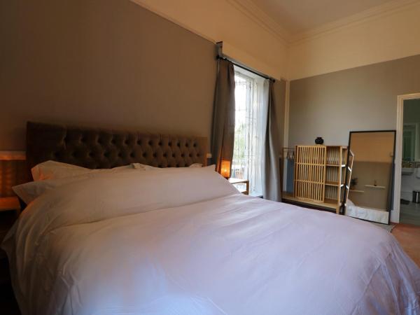 Mossley Hill Retreat : photo 2 de la chambre chambre lit king-size avec balcon