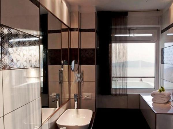 Asteras Villas : photo 3 de la chambre suite venus avec jacuzzi - vue sur caldera