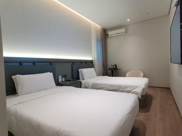 Shanghai Ange Hotel - Next to Longyang Road Subway Station, Near New Internatonal Expo Center : photo 1 de la chambre chambre lits jumeaux supérieure