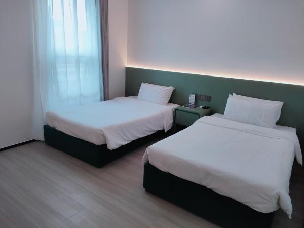 Shanghai Ange Hotel - Next to Longyang Road Subway Station, Near New Internatonal Expo Center : photo 1 de la chambre chambre lits jumeaux deluxe