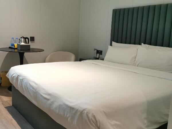 Shanghai Ange Hotel - Next to Longyang Road Subway Station, Near New Internatonal Expo Center : photo 1 de la chambre chambre supérieure lit queen-size