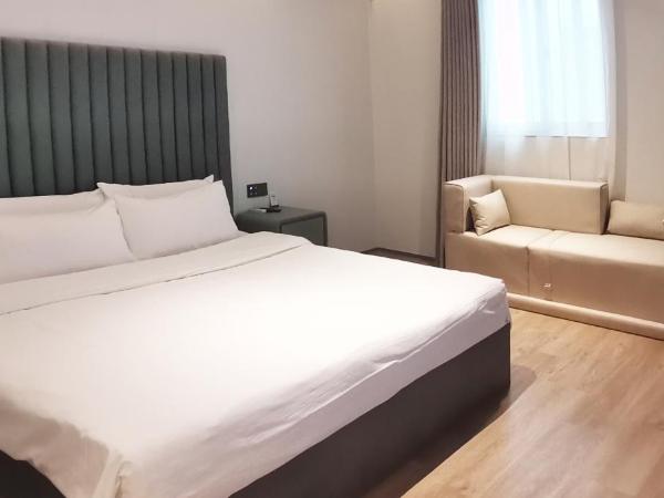 Shanghai Ange Hotel - Next to Longyang Road Subway Station, Near New Internatonal Expo Center : photo 1 de la chambre chambre lit queen-size deluxe