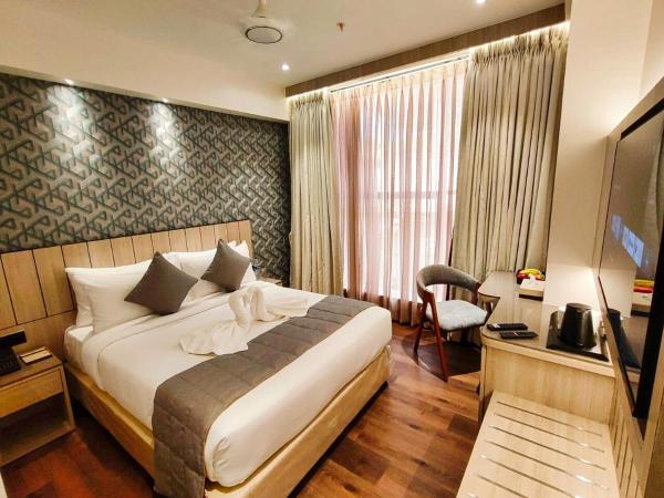 Maxxvalue Hotel MIDC - Andheri : photo 6 de la chambre chambre lit king-size deluxe