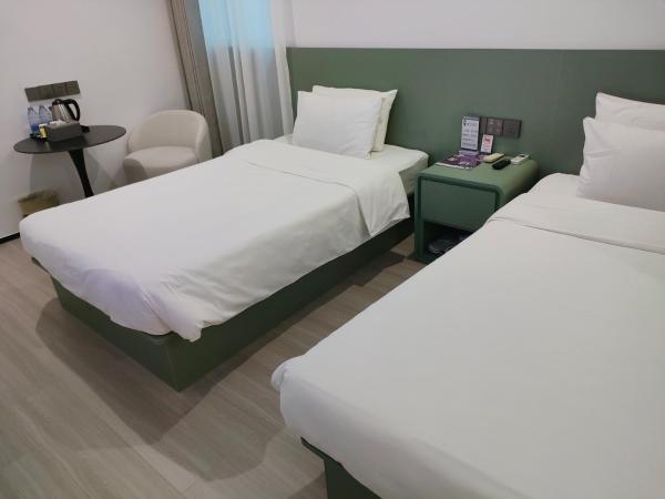 Shanghai Ange Hotel - Next to Longyang Road Subway Station, Near New Internatonal Expo Center : photo 2 de la chambre chambre lits jumeaux supérieure