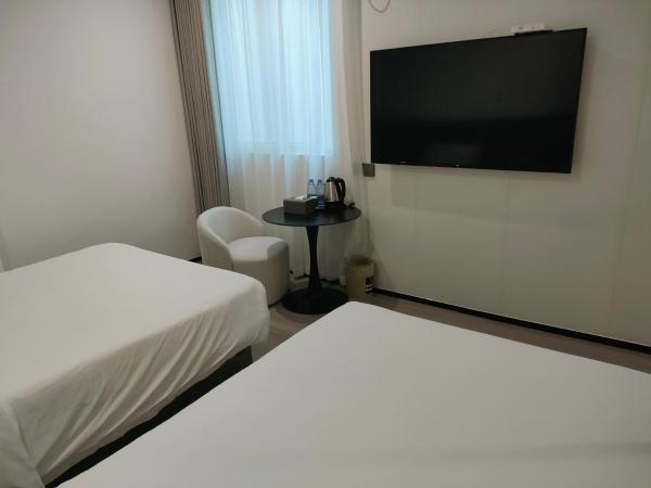 Shanghai Ange Hotel - Next to Longyang Road Subway Station, Near New Internatonal Expo Center : photo 5 de la chambre chambre lits jumeaux supérieure
