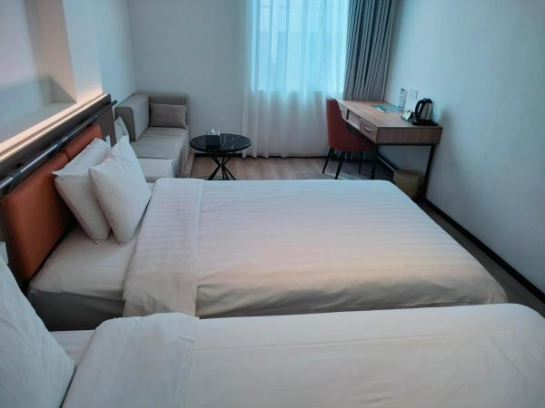 Shanghai Ange Hotel - Next to Longyang Road Subway Station, Near New Internatonal Expo Center : photo 2 de la chambre chambre lits jumeaux deluxe
