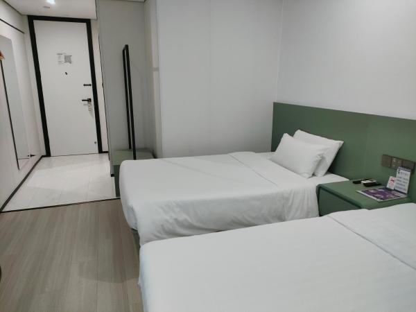 Shanghai Ange Hotel - Next to Longyang Road Subway Station, Near New Internatonal Expo Center : photo 3 de la chambre chambre lits jumeaux deluxe