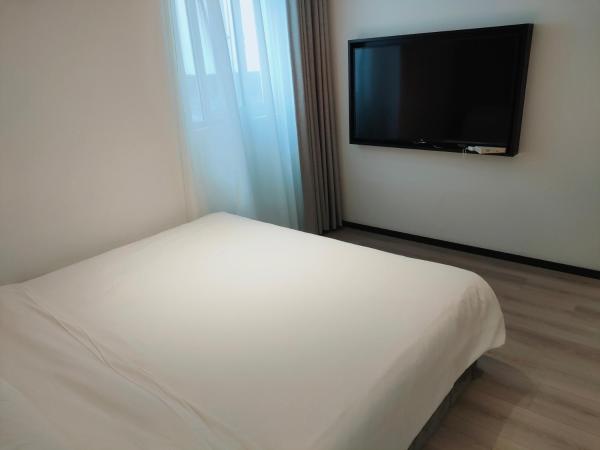 Shanghai Ange Hotel - Next to Longyang Road Subway Station, Near New Internatonal Expo Center : photo 3 de la chambre chambre lit queen-size deluxe