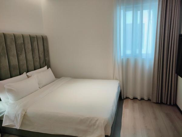 Shanghai Ange Hotel - Next to Longyang Road Subway Station, Near New Internatonal Expo Center : photo 2 de la chambre chambre lit queen-size deluxe