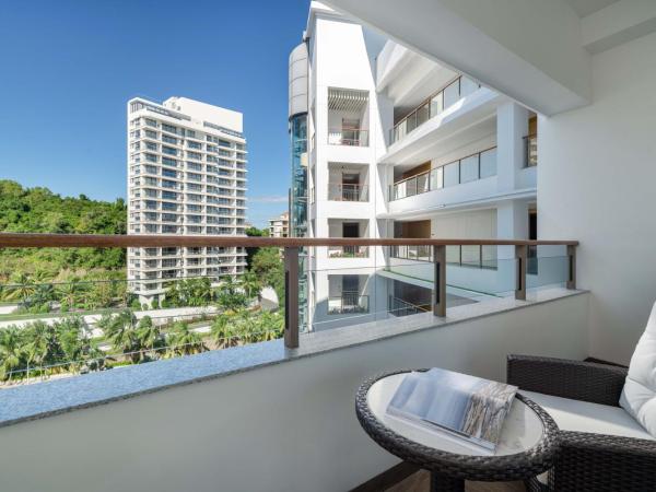 Sanya Junji Seaview Hotel : photo 4 de la chambre chambre lits jumeaux de luxe - vue sur jardin
