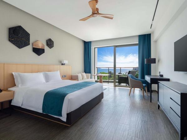 Sanya Junji Seaview Hotel : photo 1 de la chambre chambre lit king-size deluxe - vue sur mer