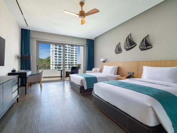 Sanya Junji Seaview Hotel : photo 3 de la chambre chambre lits jumeaux de luxe - vue sur jardin
