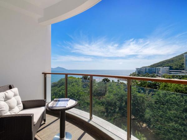 Sanya Junji Seaview Hotel : photo 2 de la chambre chambre lit king-size deluxe - vue sur mer