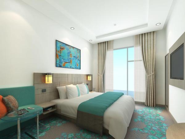 Holiday Inn Express Kolkata Airport, an IHG Hotel : photo 6 de la chambre chambre lit queen-size standard - accessible aux personnes à mobilité réduite