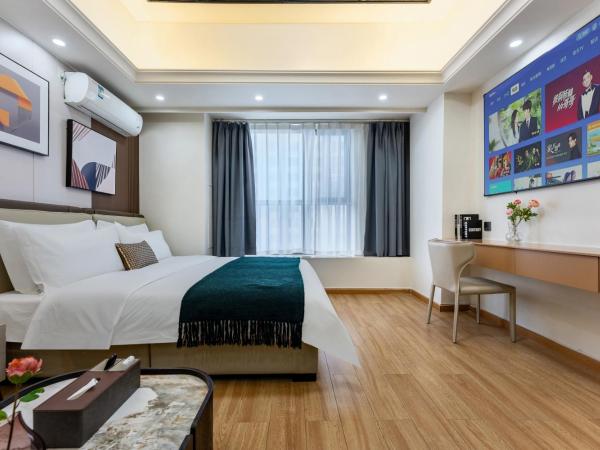 East Maple International Apartment - Guangzhou Luogang Wanda Plaza Suyuan Metro Station : photo 6 de la chambre chambre lit queen-size deluxe