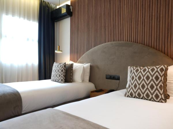 Le M Hôtel : photo 1 de la chambre chambre double ou lits jumeaux