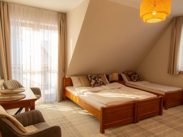 Tatrzańska Przystań : photo 5 de la chambre chambre triple standard