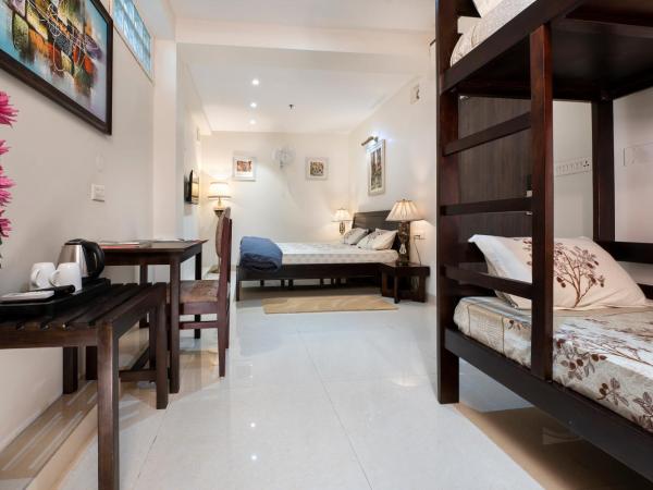 House of Backpackers : photo 2 de la chambre chambre quadruple avec salle de bains privative