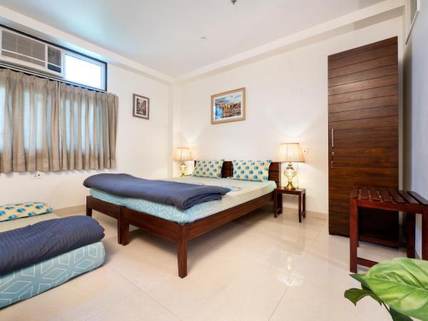 House of Backpackers : photo 1 de la chambre chambre triple avec salle de bains privative