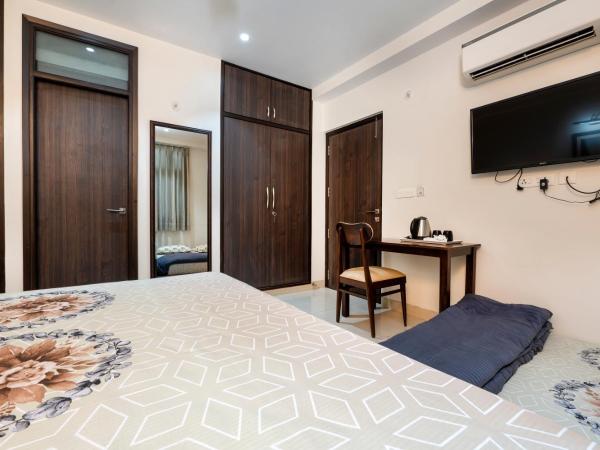 House of Backpackers : photo 2 de la chambre chambre triple avec salle de bains privative