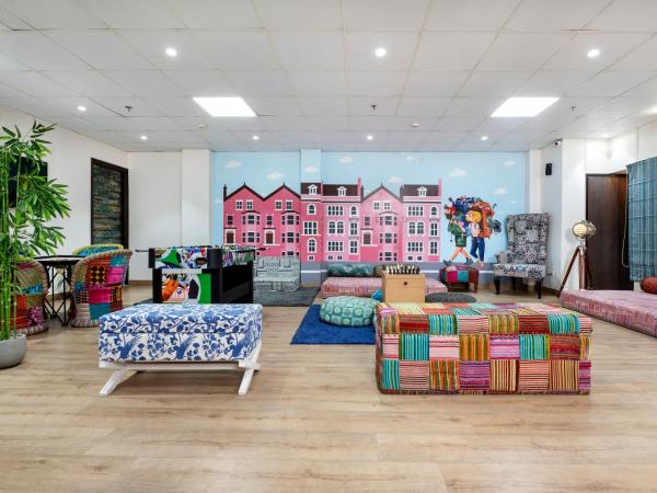 House of Backpackers : photo 1 de la chambre chambre quadruple avec salle de bains privative