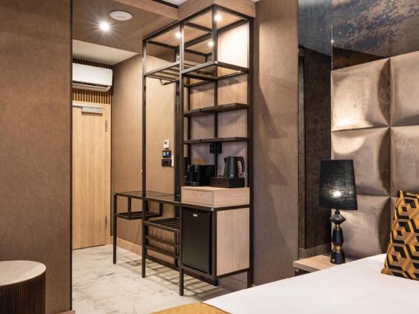 Art Suites Luxury Hotel : photo 10 de la chambre grande suite avec jacuzzi