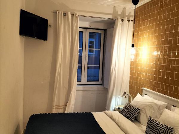 Flores Guest House : photo 4 de la chambre chambre lit queen-size deluxe