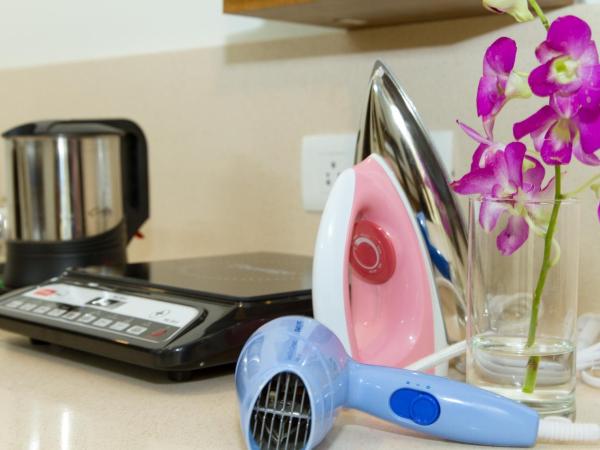 Sanctum Suites Whitefield Bangalore : photo 3 de la chambre chambre supérieure lit queen-size