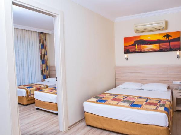 Gardenia Beach : photo 1 de la chambre chambre familiale