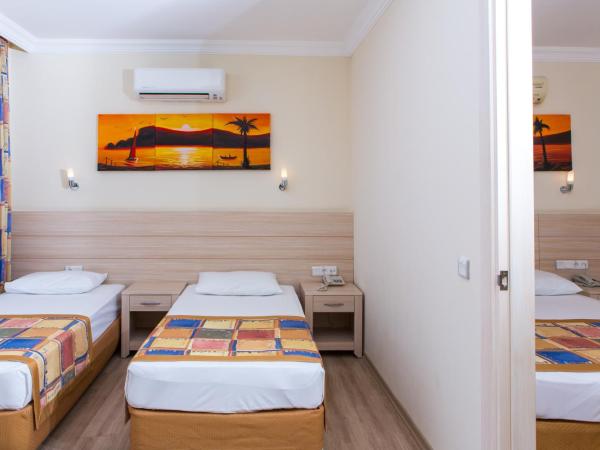 Gardenia Beach : photo 3 de la chambre chambre familiale