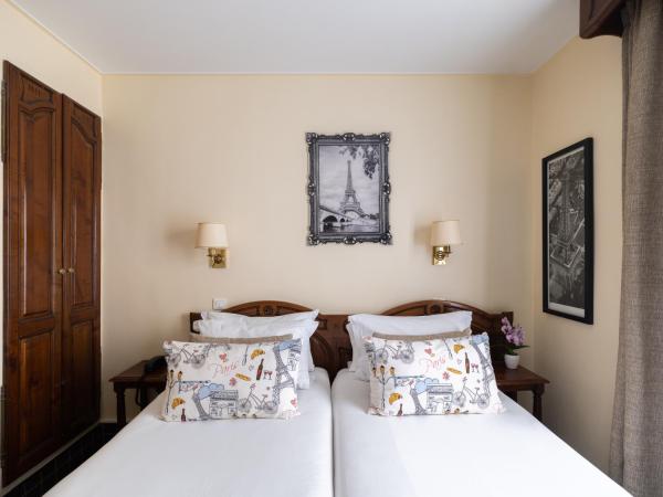 Hotel Minerve : photo 4 de la chambre petite chambre lits jumeaux