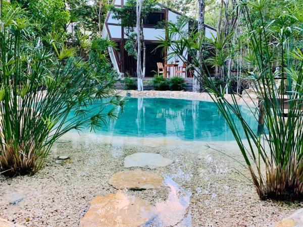 Nahouse Jungle Lodges : photo 3 de la chambre villa - vue sur jardin