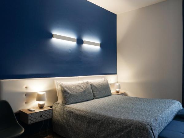 SalernoPrestige rooms : photo 9 de la chambre chambre double