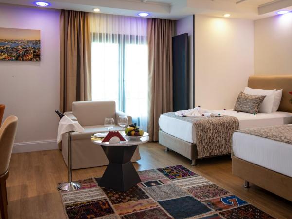 Antusa Design Hotel & Spa : photo 5 de la chambre chambre familiale avec canapé-lit