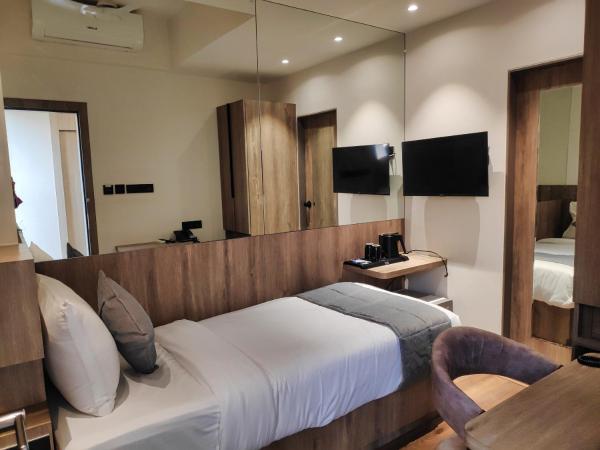 Maxxvalue Hotel MIDC - Andheri : photo 2 de la chambre chambre double Économique
